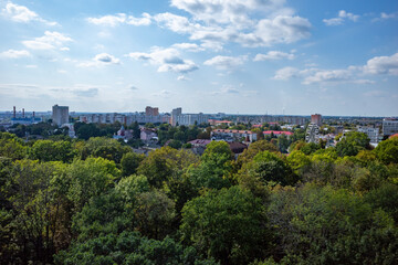 Fototapeta premium Aerial panoramic view of city skyline with green park