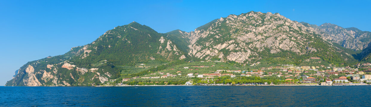 view from lake Garda to Limone tourist resort and mountains. landscape north italy