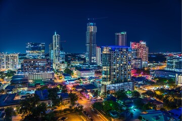 Fototapeta premium Austin Skyline at Night: A Dazzling Urban Tapestry of Illuminated Towers, Vibrant Streets, and Electric City Life Beneath the Deep Texas Sky