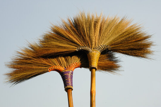 Handmade bamboo broom and dry grass