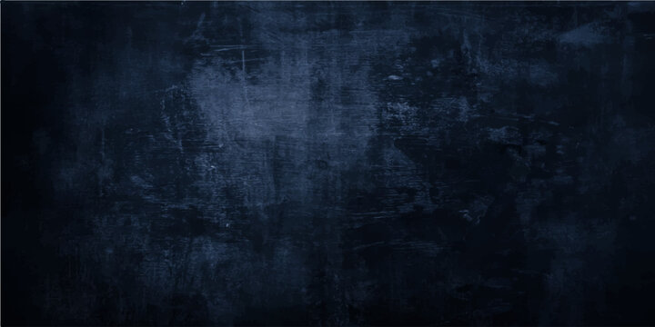 A dark blue vintage grunge background featuring an old blackboard texture with chalk marks on an aged paper surface creates a blank dirty wall pattern for a textured design backdrop