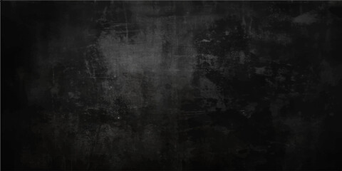 Naklejka premium A dark aged concrete wall texture with a black vintage grunge background effect provides a blank dirty surface for an old chalkboard backdrop design