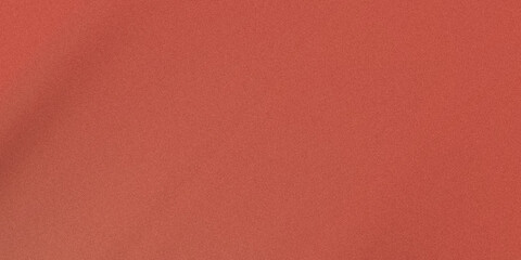 Fototapeta premium Abstract image showing a vibrant orange-red background with subtle granular texture creating a visually rich pattern.