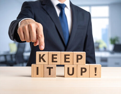 Keep it up! - Geschäftsmann zeigt auf den Text "Keep it up!"