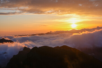 Fototapeta premium Sunset in Madeira where golden light meets the Atlantic and every moment feels like magic — nature, peace, and unforgettable views