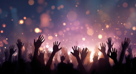 Fototapeta premium Crowd raises hands at music event in evening with bright lights and colorful background