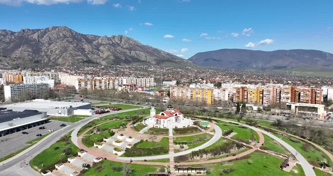 Aerial view over Modern Orthodox Church St. Petka in Sliven city Bulgaria with Balkan Mountains landscape on Background