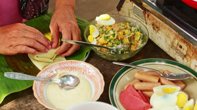 Woman preparing traditional indonesian food salad solo