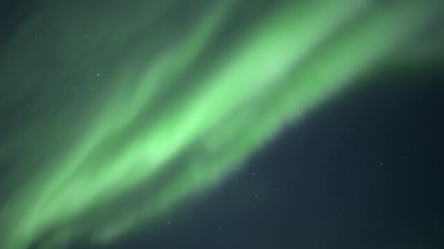 Strong aurora borealis filling the night sky, real time