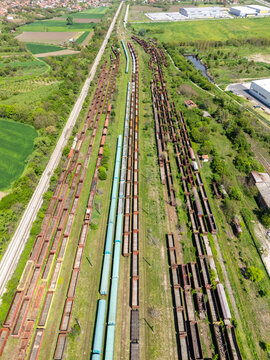 Aerial view of a railway transport hub with freight wagons