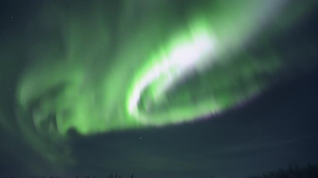 Strong Aurora Borealis With Camera Pan and Tilt Across Arctic Night Sky, Real Time
