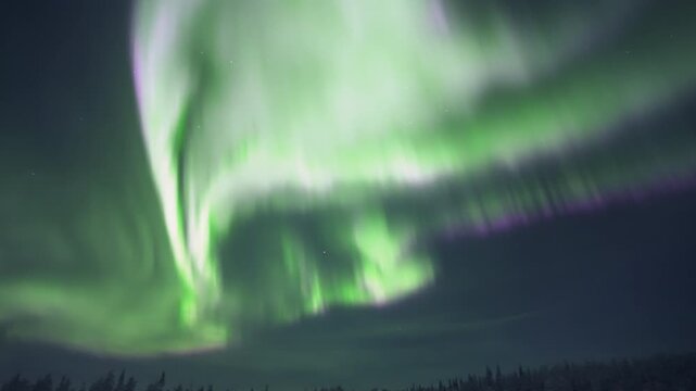 Powerful Aurora Borealis Sweeping Across Night Sky With Camera Movement, Real Time