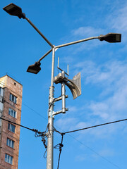 Obraz premium Loudspeaker used to issue air raid warnings during wartime, providing vital information to civilians