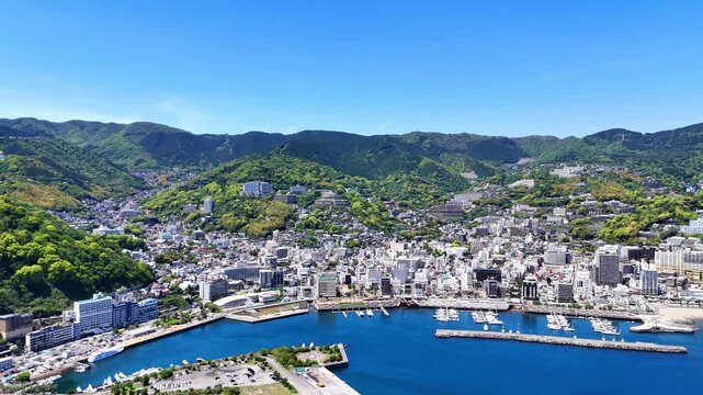 Atami Coastline | City View | Breakwater | Japan - 4K Aerial
