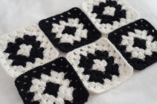 Monochrome granny squares on isolated background