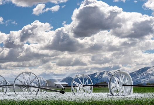 Dramatic clouds on an icy morning on a farm