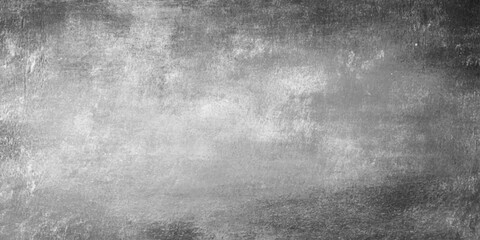 Fototapeta premium A dark aged gray metal surface features a dirty vintage grunge texture with a rough black stone pattern and old concrete wall design for a weathered backdrop