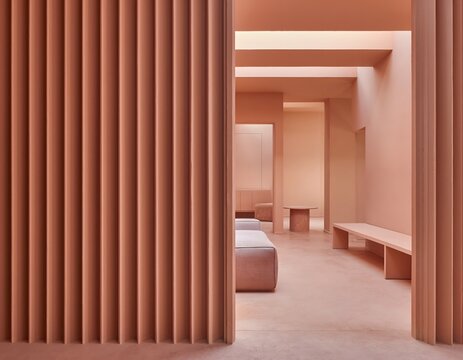 Intricate fluted paneling in a desert rose tone serves as a captivating focal point within this modern architectural interior, highlighting a serene and sophisticated monochromatic atmosphere.