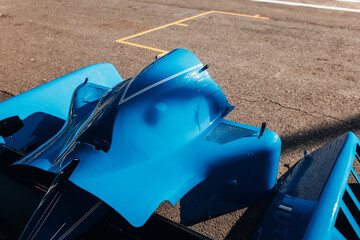 Fototapeta premium Formula 1 car components inside team garage