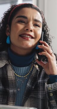 Tablet, talking and woman with phone call in creative agency, manuscript feedback and project update. Smile, draft revision tips or screenwriter with production budget negotiation, pitch idea or tech
