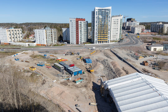 Espoo, Finland - May 1st, 2026: ongoing Meritie road construction in Suomenoja, Finnoo, Espoo, Finland, with various construction vehicles and temporary structures present