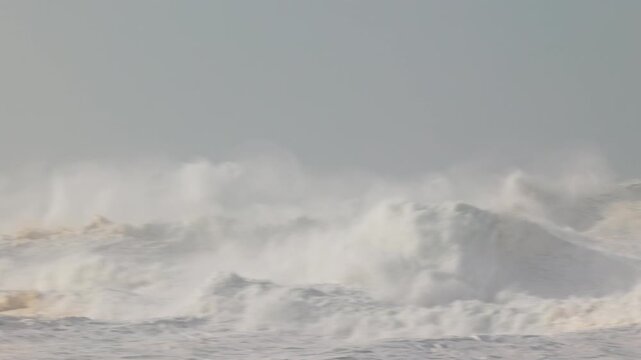 Big waves crushing in winter season in Nazare, Portugal