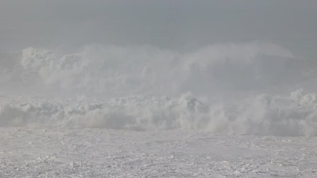 Big waves crushing in winter season in Nazare, Portugal