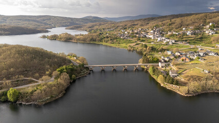 Fototapeta premium Encoro de prada reservoir with bridge, a veiga, spain