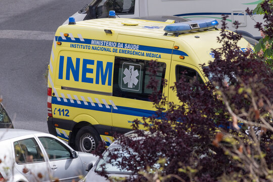 INEM emergency ambulance parked on a residential street in Portugal