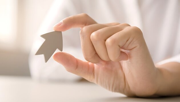 Person holding upward arrow symbol conceptual business growth idea