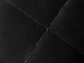 Fototapeta premium Folded Crumpled Black Paper Cardboard Texture