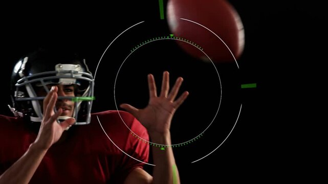 Football player tracking pass, catching and securing ball while HUD rotates showing sports stats