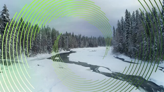 Green rings rotating and expanding, initiating drone descending, revealing open river and ice falls