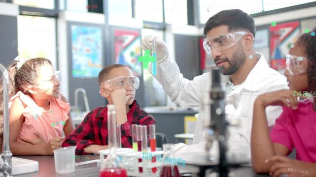Science instructor rotating test tube, causing green plus overlay on blue liquid to teach students