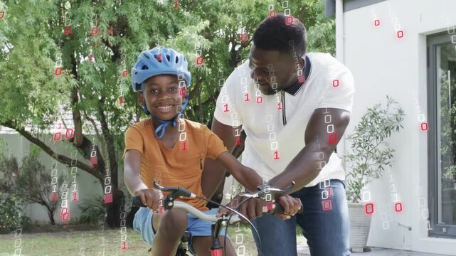 Dad moving hands holding red bike, teaching son pedaling and balancing with binary overlay for tech