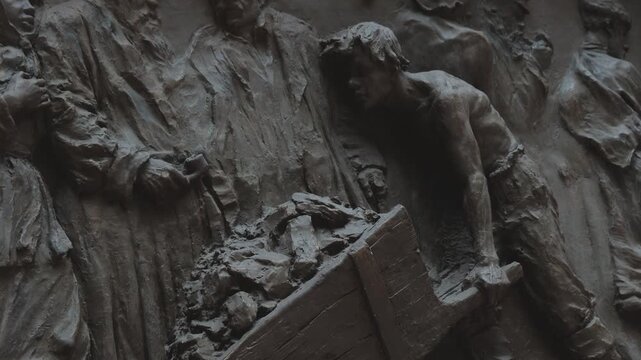Russia. St. Petersburg, August 8, 2020 A close-up view of a person holding a box in a statue form, great for representing human emotions and everyday life