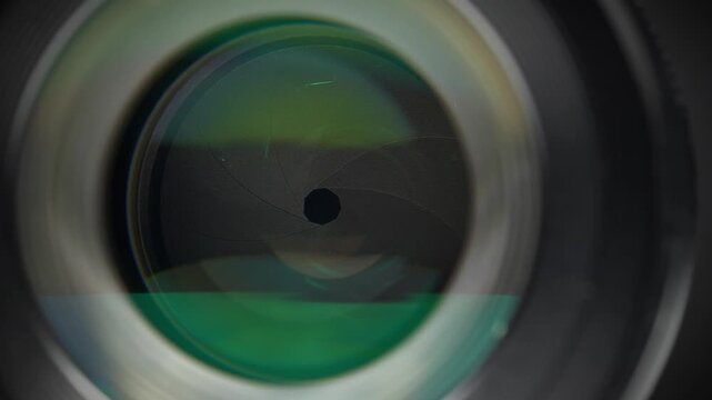 Wide-aperture lens featuring aperture and diaphragm blades, close-up video