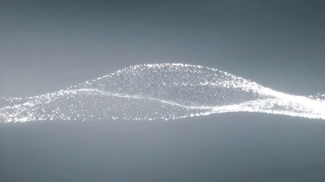 Abstract shimmering particle wave on a soft gray background, representing fluidity and movement