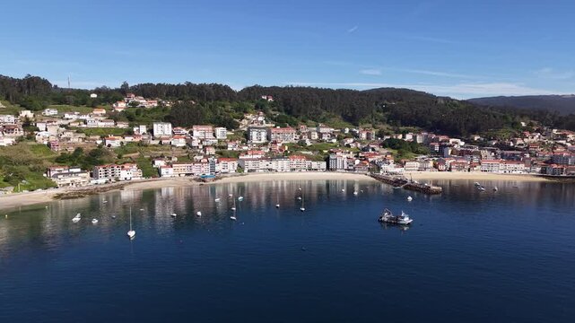 Rax&oacute;, Poio Pontevedra Galicia. Coastal town bay with fishing boats and beach