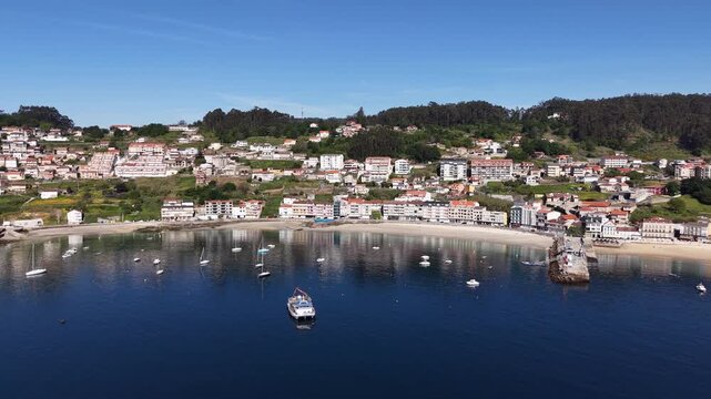Rax&oacute;, Poio Pontevedra Galicia. Coastal town bay with fishing boats and beach