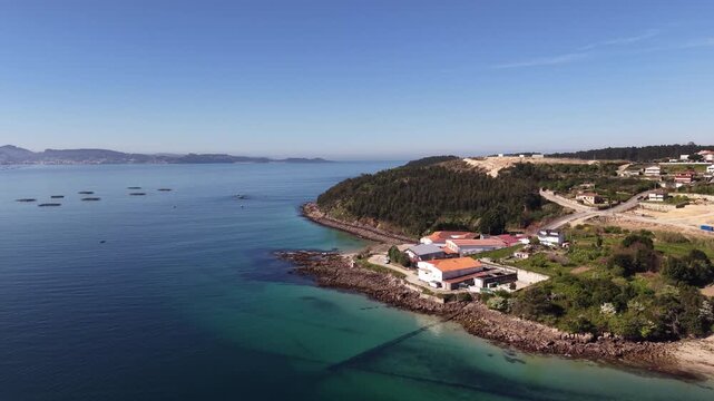 Rax&oacute;, Poio Pontevedra Galicia. Coastal town bay with fishing boats and beach