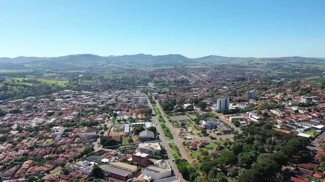 Aerial view of town of Ceres surrounded by mountains and green valleys on May, 2026. Ceres, Goias, Brazil