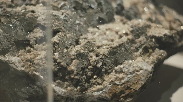 Exploring natural rock forms and textures at a geology exhibit in a local museum during an afternoon visit