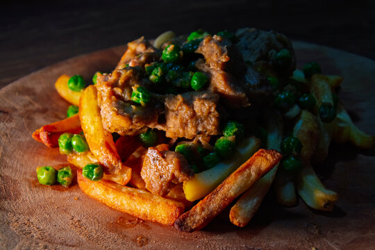 Brasso style saut&eacute;ed pork cubes with garlic and fried potatoes