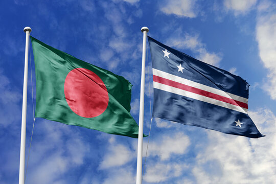 Bangladesh and Baker howland and jarvis island flags waving in a clear blue sky symbolizing a powerful diplomacy a strategic partnership, and a shared vision of unity for a sustainable future.