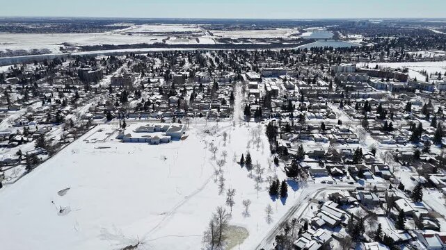Aerial view of snowy Lawson Heights neighborhood