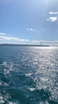 Crossing the Chacao Channel by barge from Chiloe, with a view of the Chacao Bridge under construction.