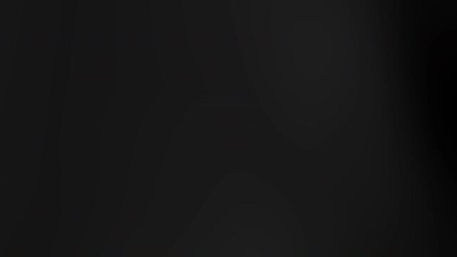 Abstract dark background with soft glowing light transitions