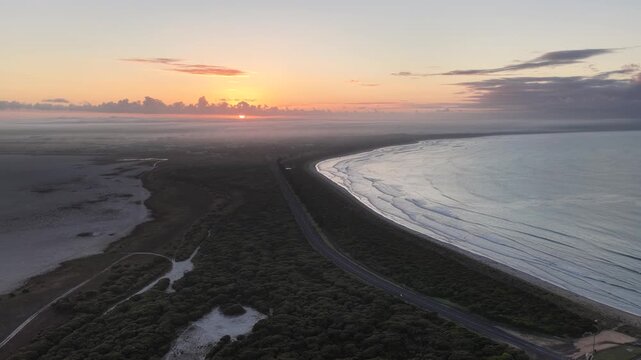 Beachport, South Australia at sunrise: 4K aerial drone footage of coastal town, golf course, calm ocean, surf beach and golden morning light.
