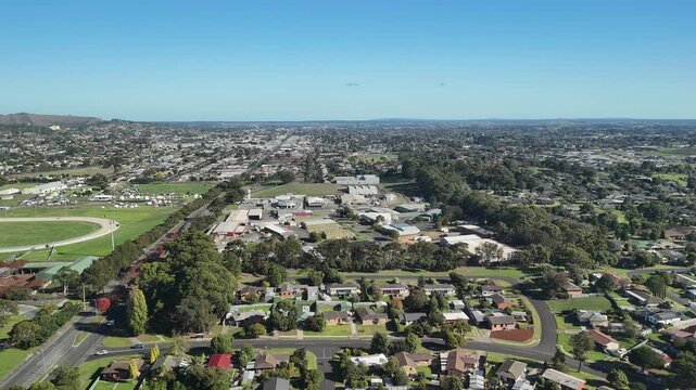 Mount Gambier, South Australia: 4K aerial drone footage of timber mill, industrial site and forestry processing facility, presidential houses near Umpherston Cave